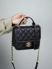 Classic Quilted Leather Top-Handle Bag, genuine leather, flap closure, on model