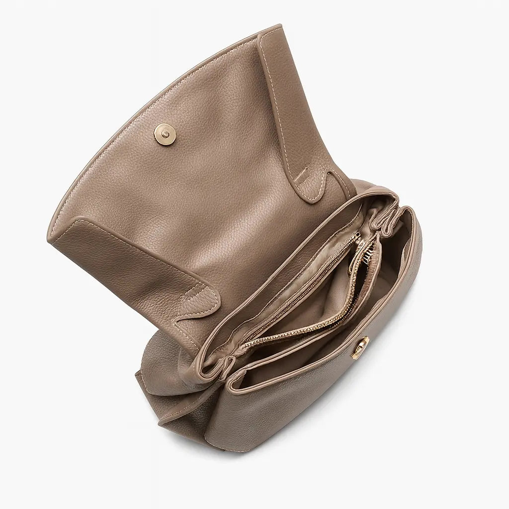 Premium Leather Crossbody Bag in khaki, showcasing interior with zipper compartment and flap closure.
