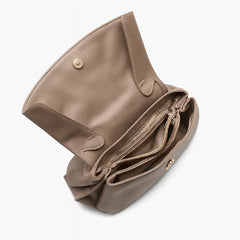 Premium Leather Crossbody Bag in khaki, showcasing interior with zipper compartment and flap closure.