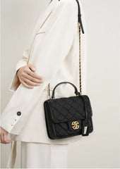 Classic Quilted Leather Top-Handle Bag, genuine leather, flap closure, on model