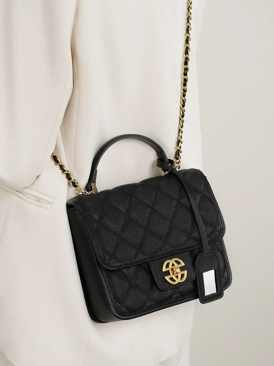 Classic Quilted Leather Top-Handle Bag, genuine leather, flap closure, on model, black