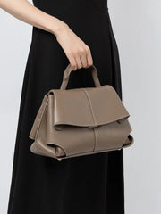 Premium Leather Crossbody Bag in khaki color, designed for urban minimalist style, perfect for everyday use.