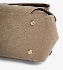 Premium Leather Crossbody Bag detailed view showing khaki top-grain cowhide with gold accents.