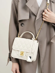 Classic Quilted Leather Top-Handle Bag, genuine leather, flap closure, on model