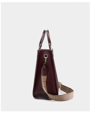 Side view of a stylish Top-Handle Leather Tote with adjustable strap, showcasing its minimalist design and lightweight structure.