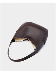 Leather Crescent Hobo Bag in dark brown, showcasing its unique shell shape and single adjustable strap.