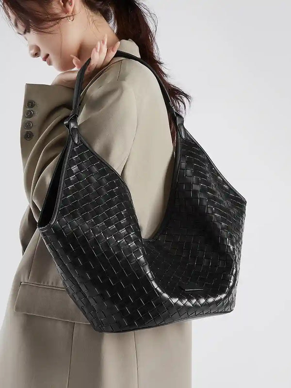 Large Woven Shoulder Bag in black, showcasing its refined texture and stylish design for everyday use.
