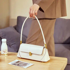 European Retro Shoulder Bag in white with a sleek design, featuring a flap and adjustable strap, perfect for casual or work use.