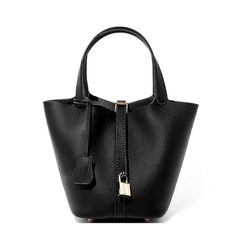 Front view of Classic Leather Bucket Bag featuring a chic design and lustrous hardware in a minimalist black tone.