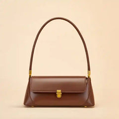 European Retro Shoulder Bag in brown leather with a slim shoulder strap and magnetic closure, perfect for casual outings.
