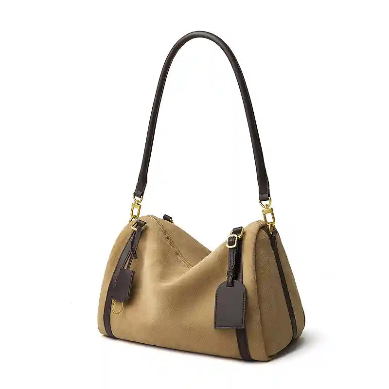 Suede Crescent Shoulder Bag with leather trims and adjustable strap, perfect for casual and date-night outings.