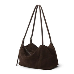 Suede Leather Pillow Hobo Bag featuring dual shoulder straps and a sleek silhouette for stylish everyday use.