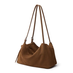 Suede Leather Pillow Hobo Bag in brown with dual shoulder straps and a sleek, modern silhouette.