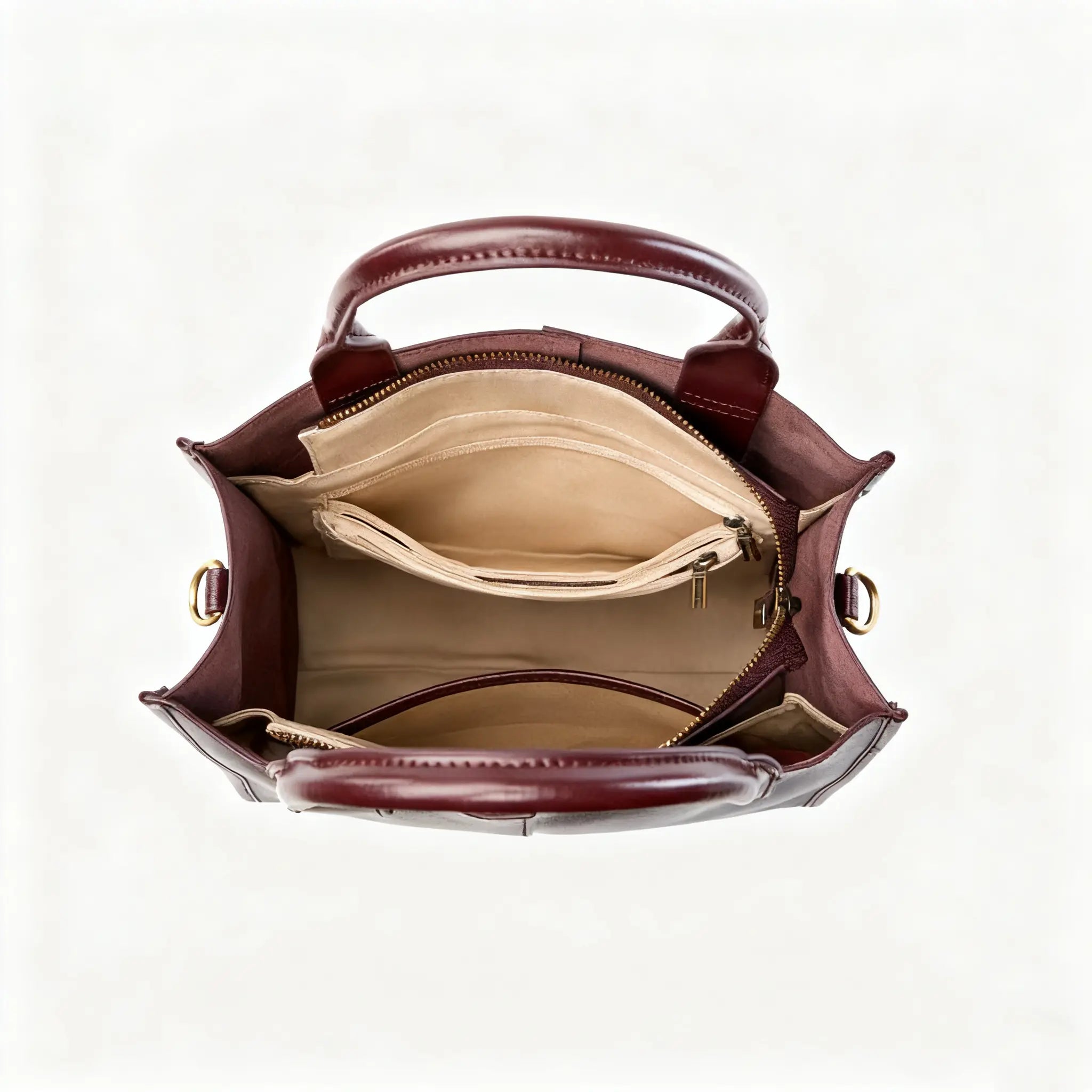 Top-Handle Leather Tote showcasing a spacious interior with multiple pockets and compartments for organization.