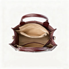 Top-Handle Leather Tote showcasing a spacious interior with multiple pockets and compartments for organization.